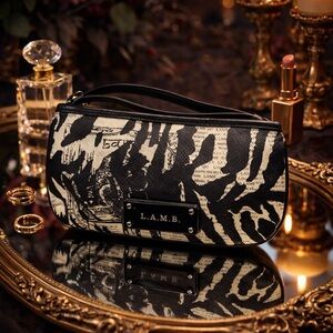L.A.M.B. Black and Cream Zebra-Print Wristlet